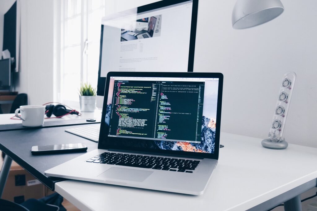 Python Programming Certification course image showing coding concepts and learning tools